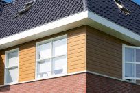 gele gevelbekleding